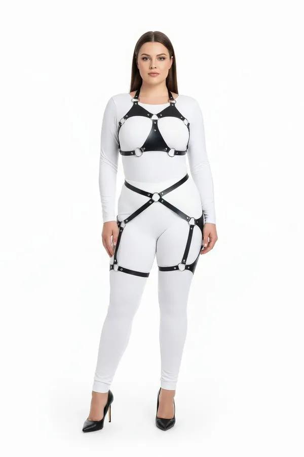 black faux leather full body harness with silver O-rings structured chest panel and thigh garters worn over white outfit