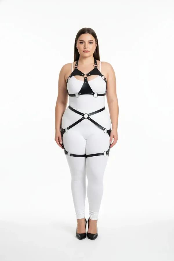 black faux leather full body harness with silver O-rings structured chest panel and thigh garters worn over white outfit