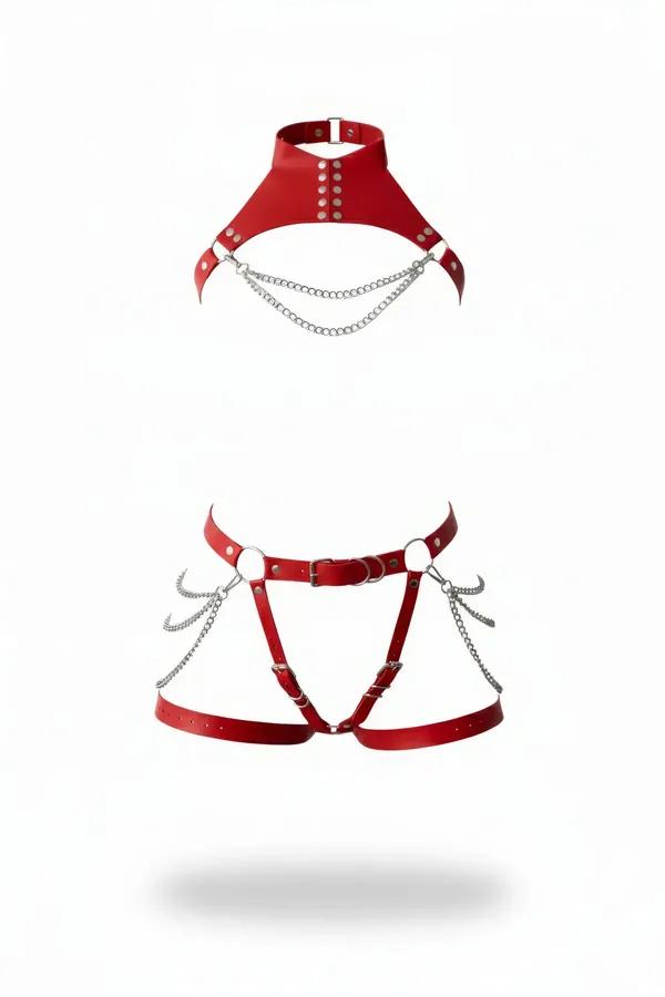 Red faux leather harness set featuring a high-neck bib choker collar with draped silver chains and a matching garter belt.