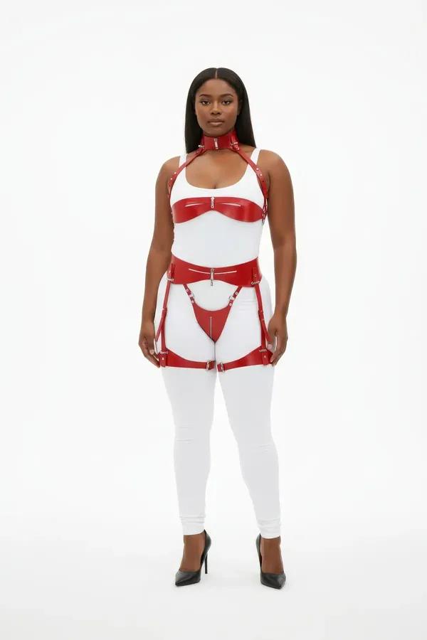 Red patent faux leather body harness and garter set with silver zip hardware and choker collar, front view on model