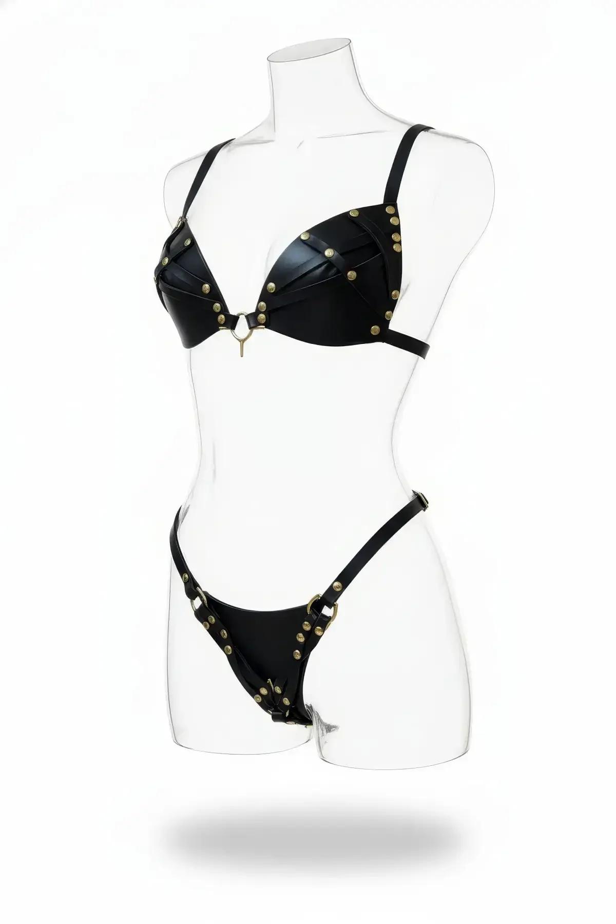 black faux leather studded harness bra and thong set with antique gold dome studs and O-ring center detail on mannequin