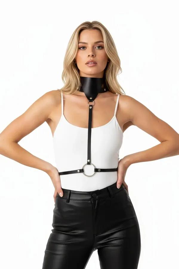 black faux leather high collar body harness with silver O-ring drop worn over white top