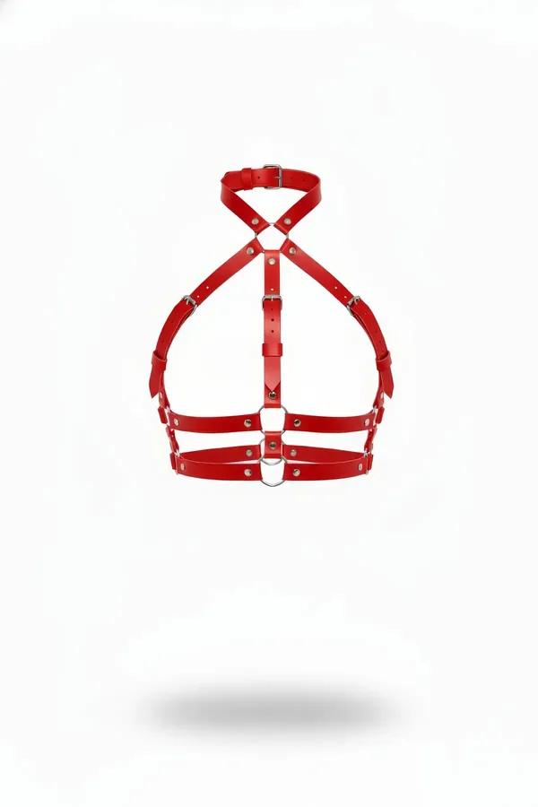 red faux leather halter chest harness with X-cross straps and silver O-ring center detail on white background