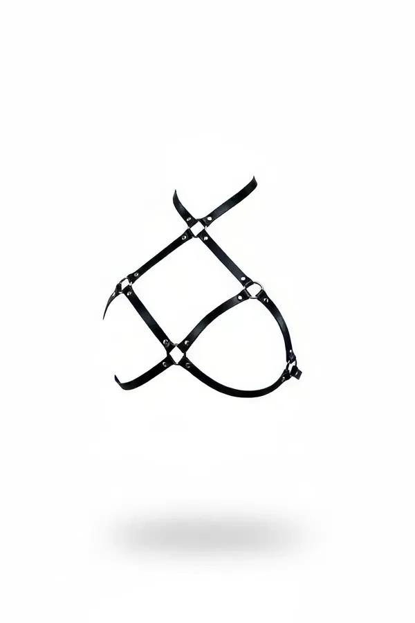 black faux leather caged chest harness with silver O-rings and diamond stud rivets on white background
