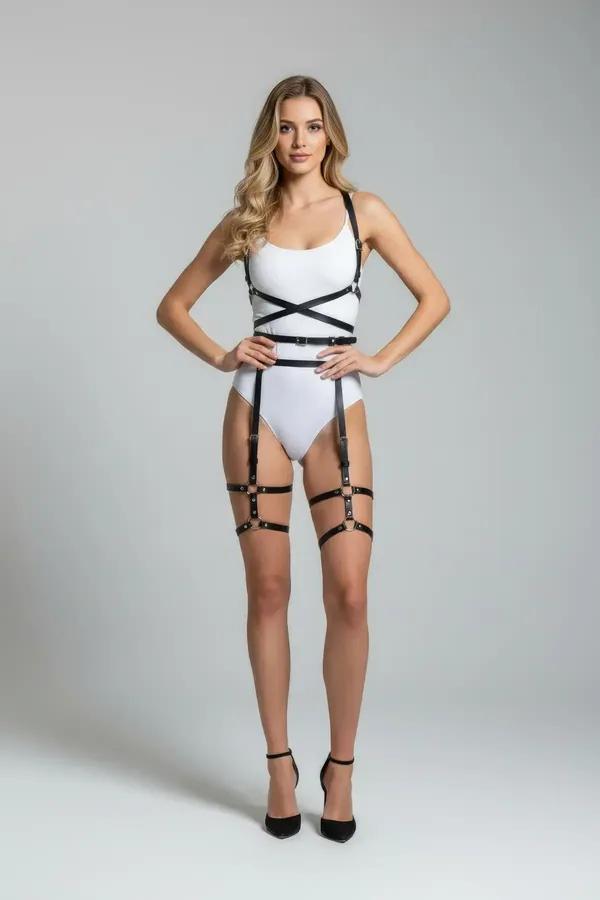 black faux leather full body harness set with crisscross chest straps and double-band thigh garters gold hardware