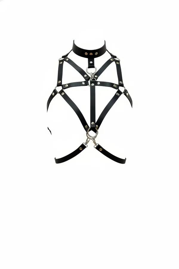 Black faux leather chest harness with high collar, geometric cage straps, silver O-rings and rivets, white background