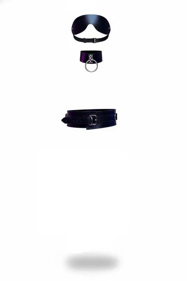 black faux leather eye mask collar and belt set with silver O-ring hardware laid flat on white background