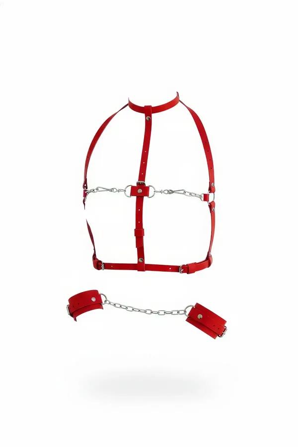 Red faux leather body harness with silver chain waist panel and detachable wrist cuffs on white background