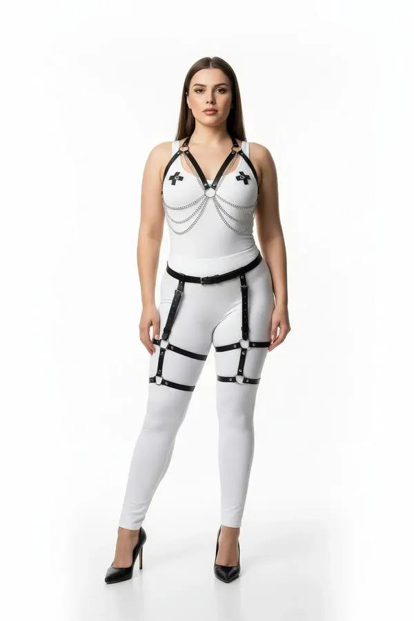 black vegan leather body harness and leg garter set with silver chain draping and cage thigh straps on model