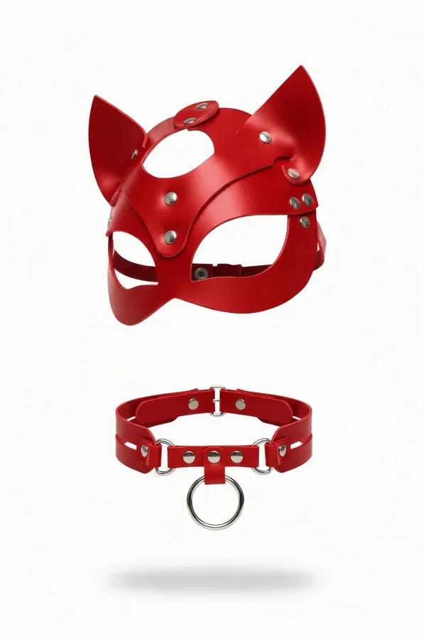 Red faux leather cat ears mask with silver rivets and matching O-ring choker collar set on white background