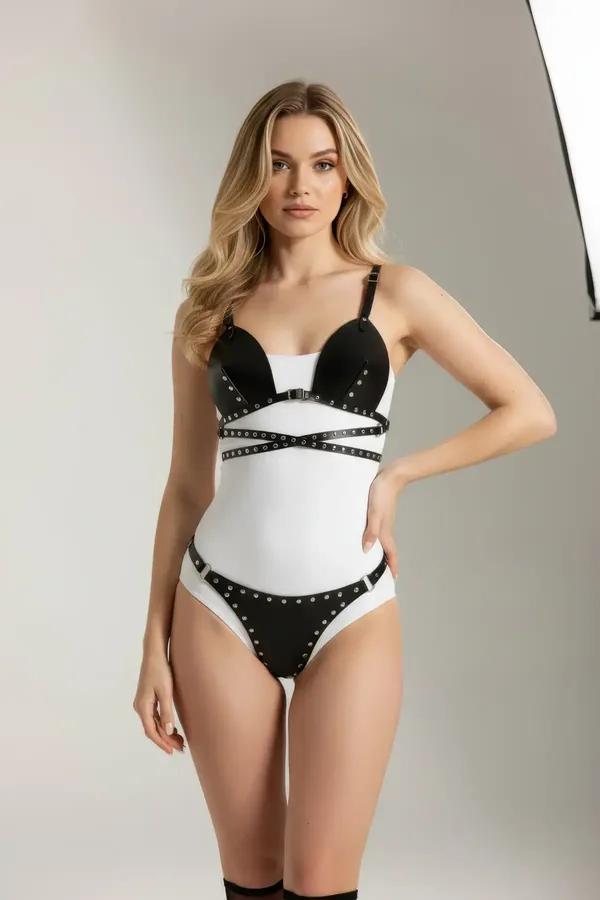 black studded faux leather harness bralette and panty set with silver rivet trim on shoulder and under-bust straps