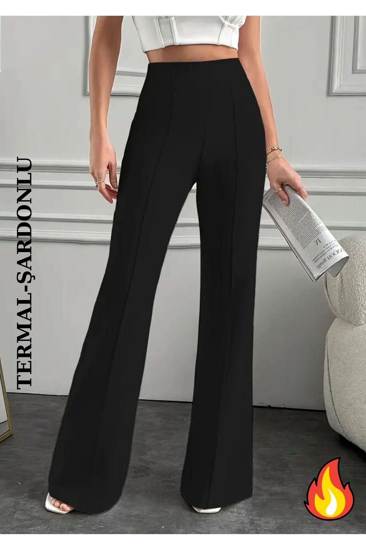Black High Waist Flared Pants with Front Seam, model in white crop top
