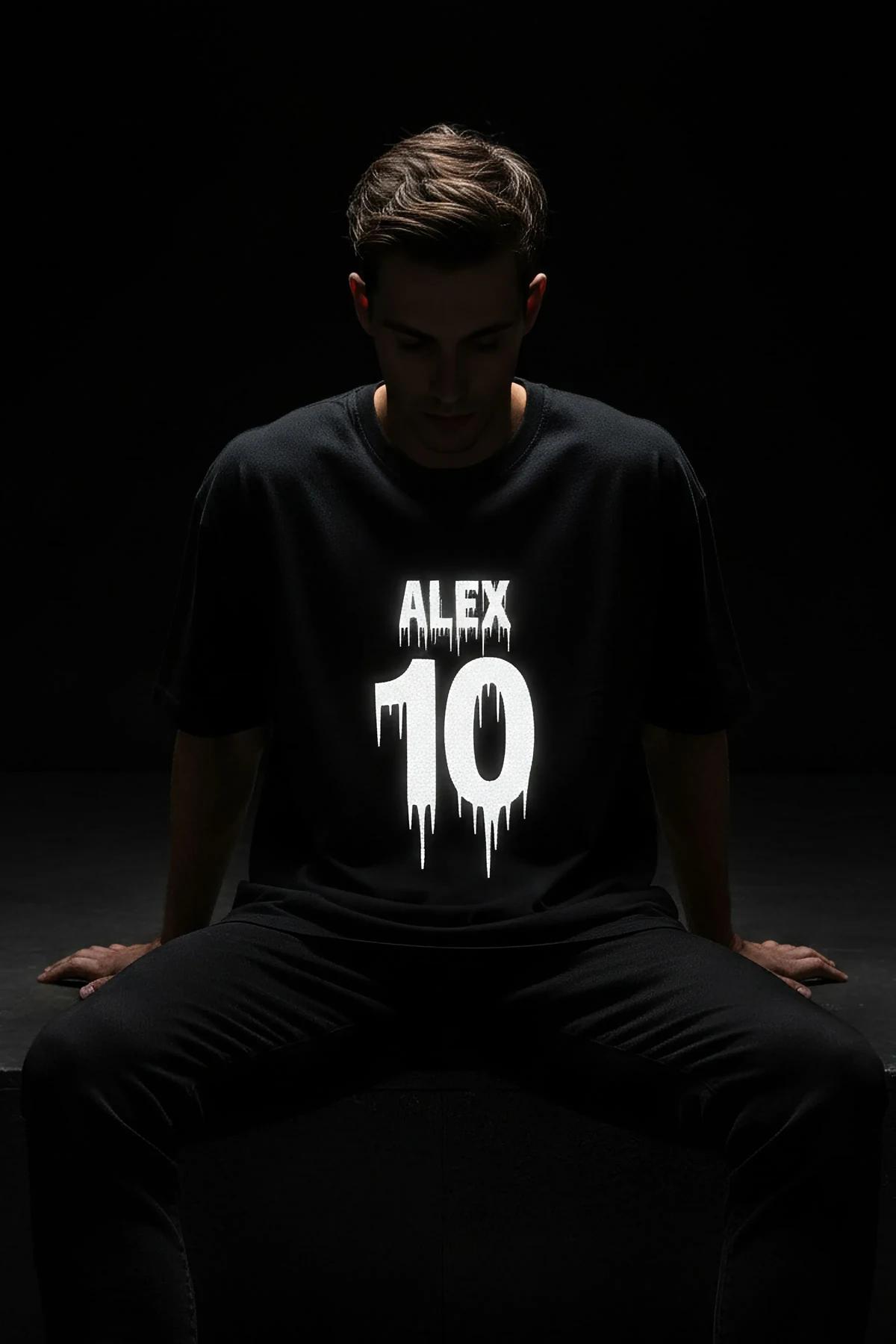 black oversized sport jersey back view with large white reflective number 10 and custom name print