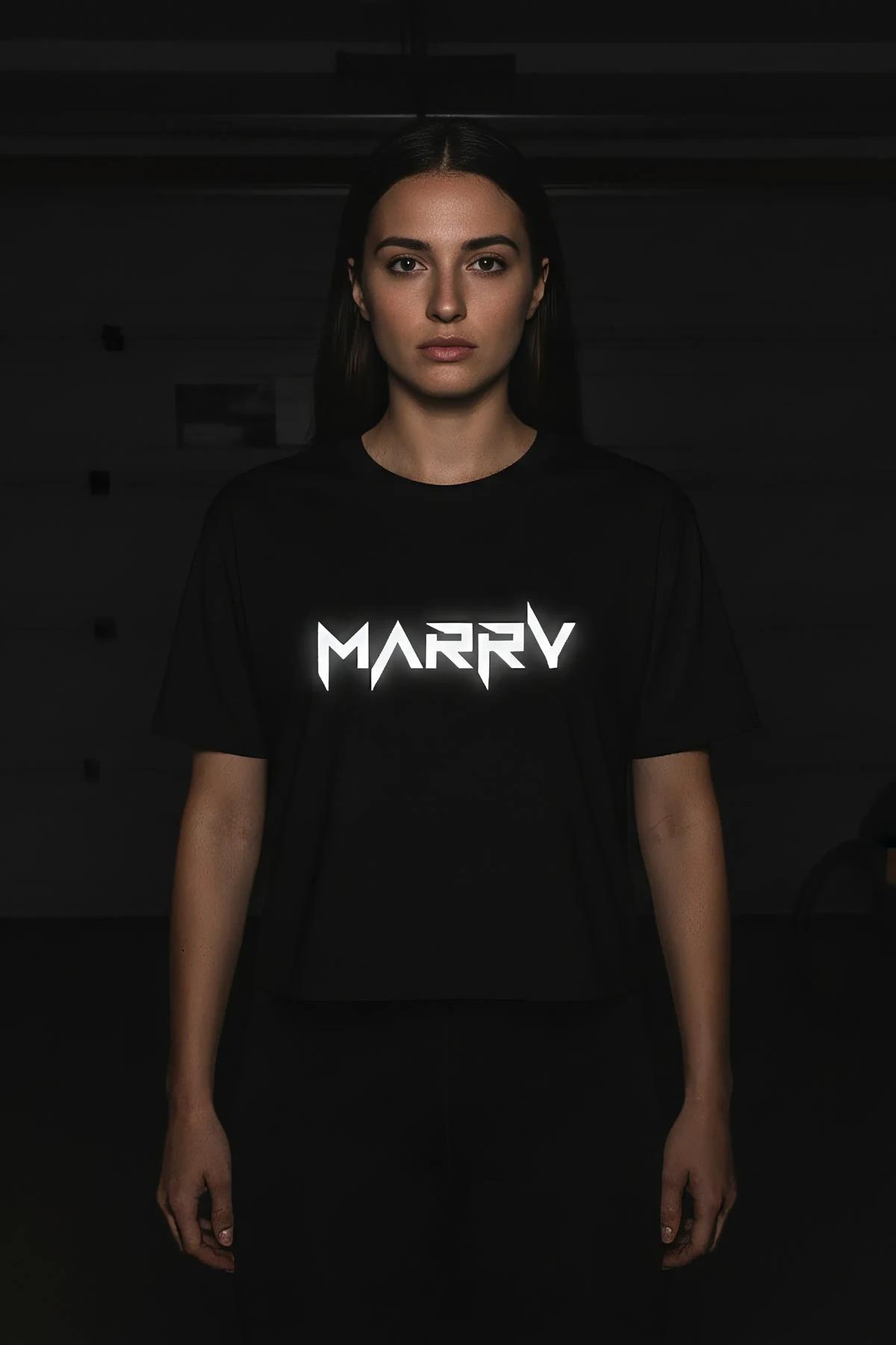black oversized crop top with bold reflective white MARRY text graphic in jagged font across chest