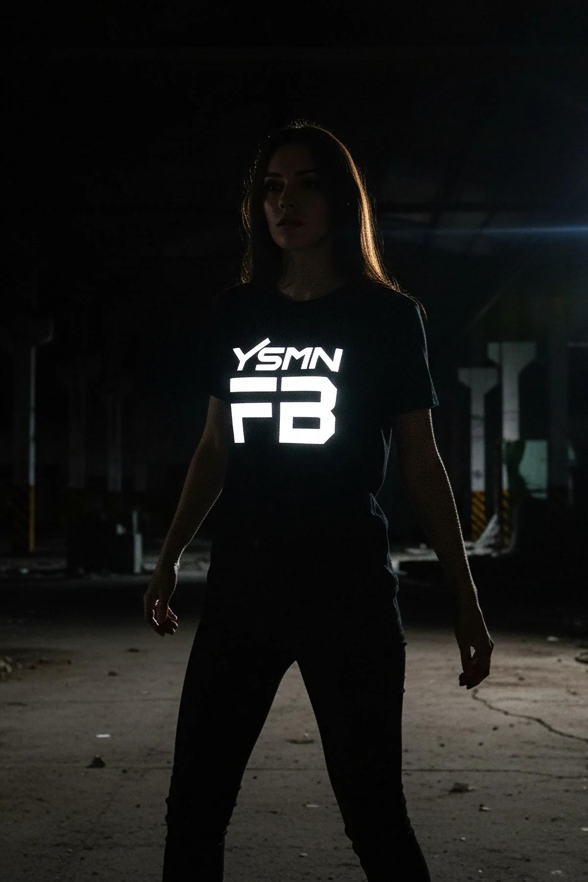 Black t-shirt with reflective YSMN FB logo graphic on front