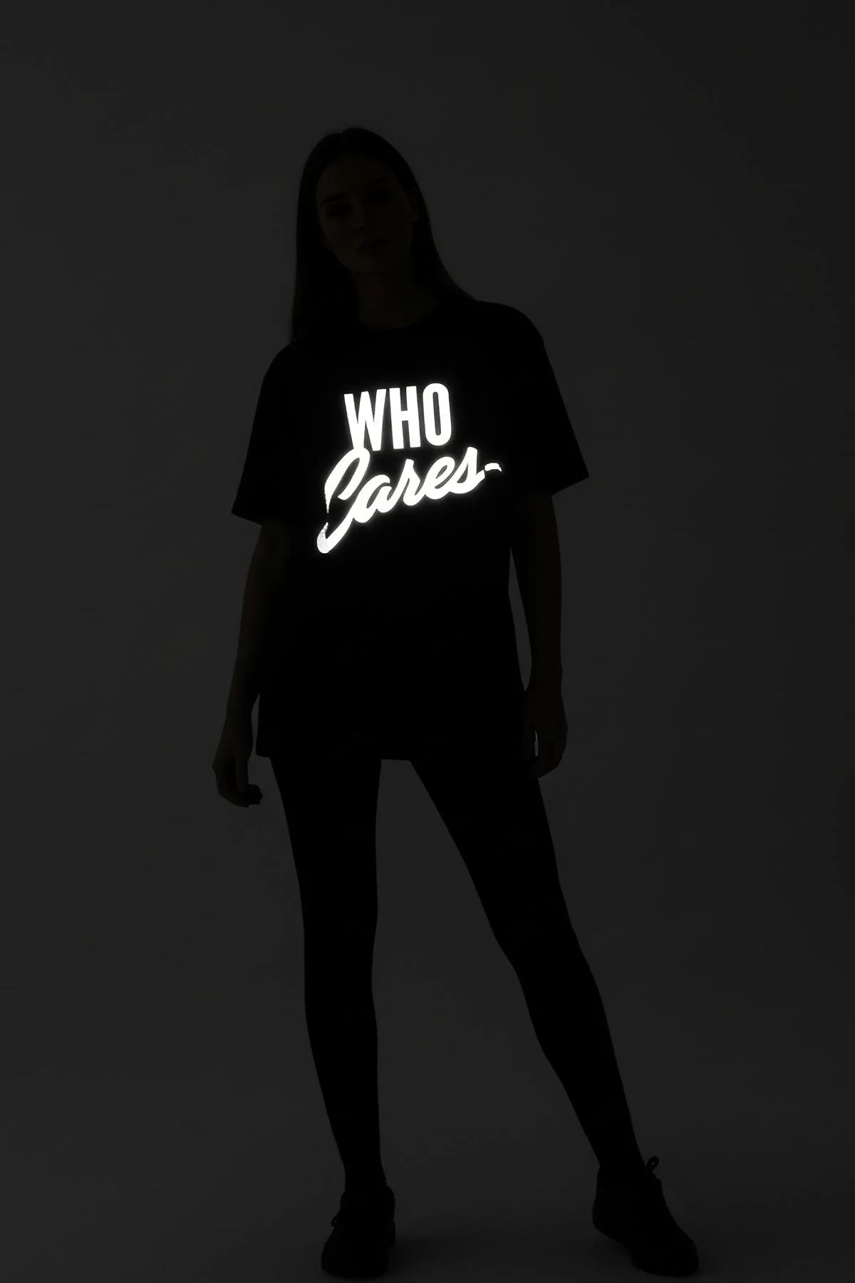 custom reflective graphic tee black oversized back view with bold white name and number lightning bolt print