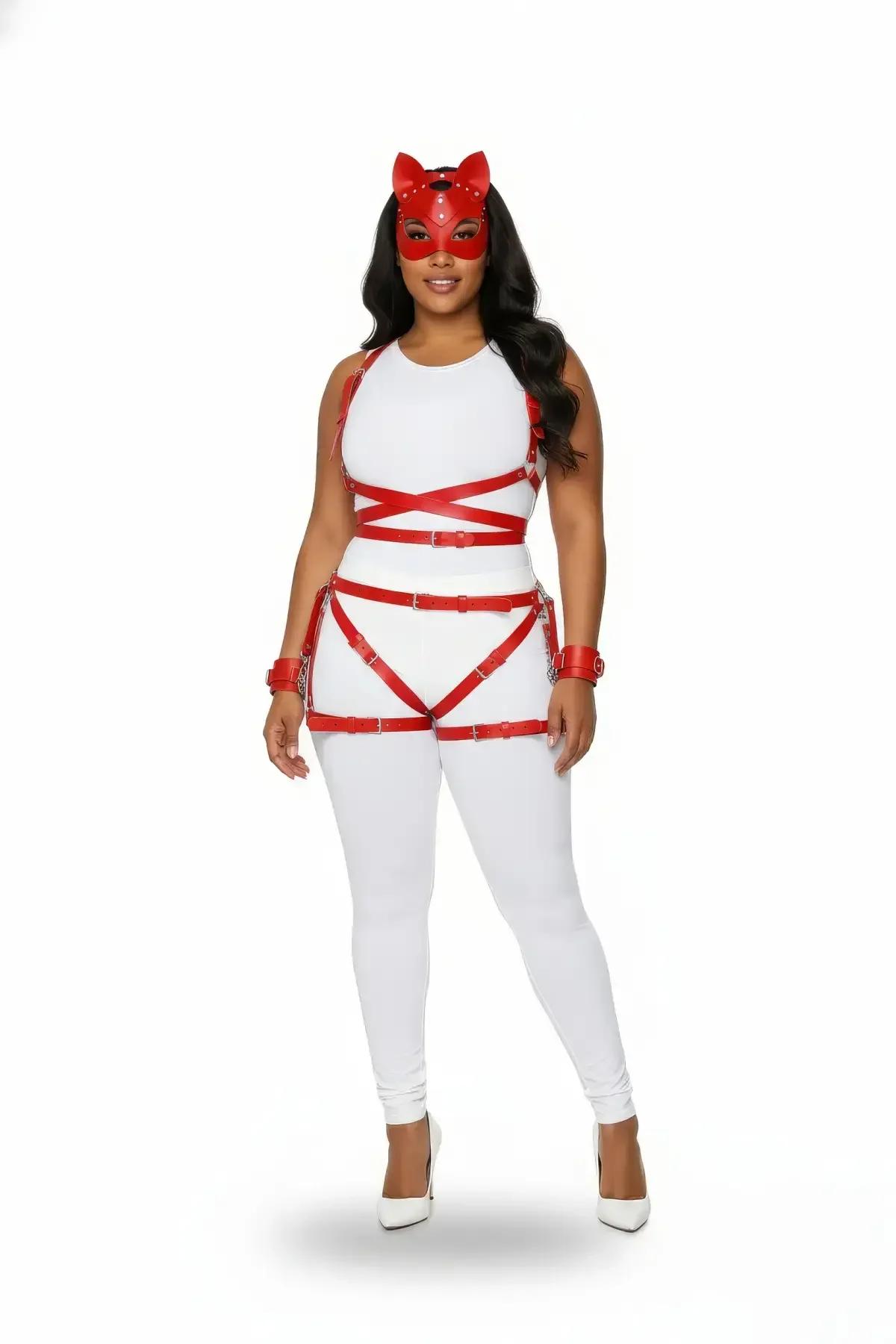 red faux leather full body strap harness set with thigh garter wrist cuffs and cat-ear mask worn over white outfit silver buc