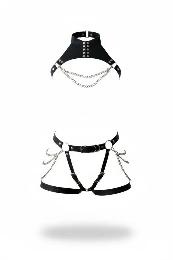 Garter harness set in black vegan leather featuring a studded choker collar and draping silver chains on chest and thighs.