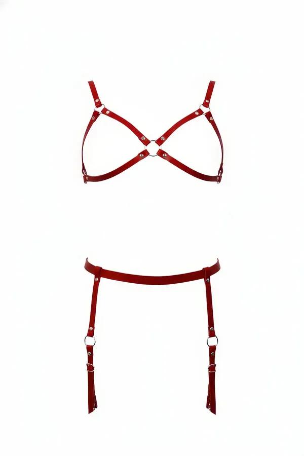 Red vegan leather harness bra and garter set with silver O-rings and adjustable buckle straps on white background