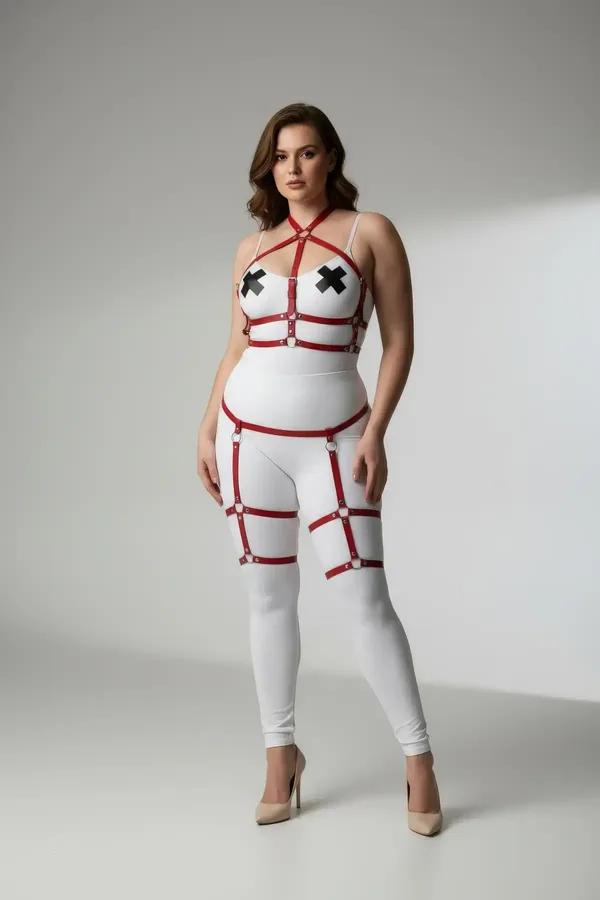 Red faux leather strappy body harness with criss-cross chest, waist band, and dual thigh cage garter straps, silver O-ring ha