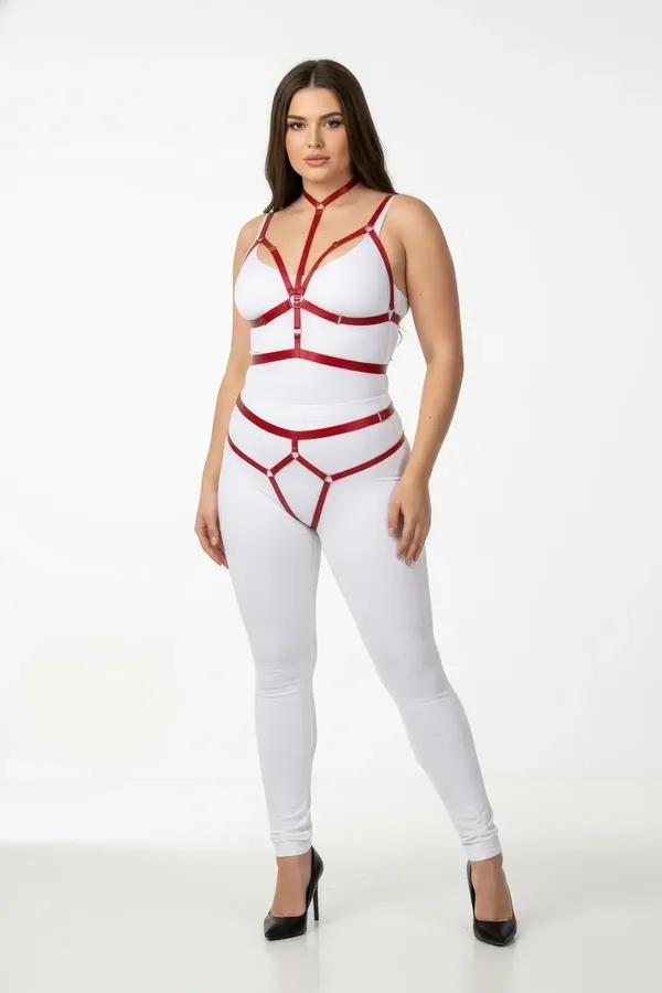 red faux leather full body cage harness with thigh straps and gold O-ring hardware on plus-size model