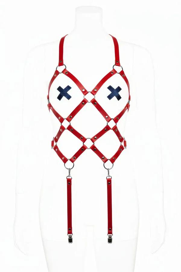 red faux leather body harness with X chest strap detail, diamond torso grid, silver O-rings, and detachable garter straps