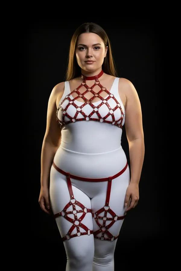 red faux leather caged halter harness and garter set with gold O-ring hardware on plus size model