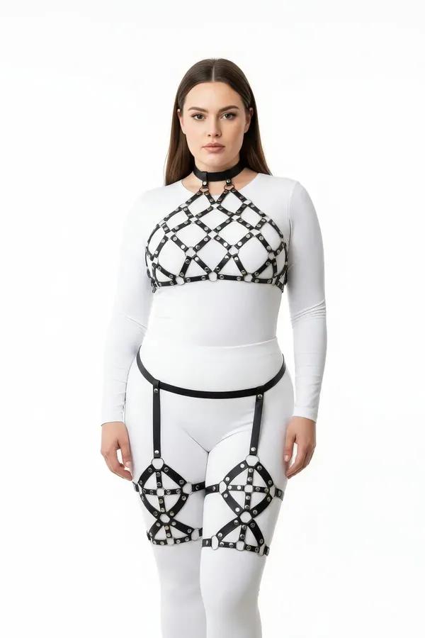 Black faux leather caged full body harness set with diamond chest cage, choker, and caged thigh garters worn over white base