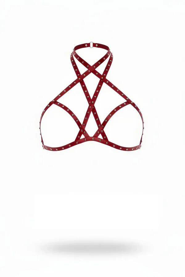 Cherry red vegan leather chest harness with silver dome studs and crossover halter neck straps, front view