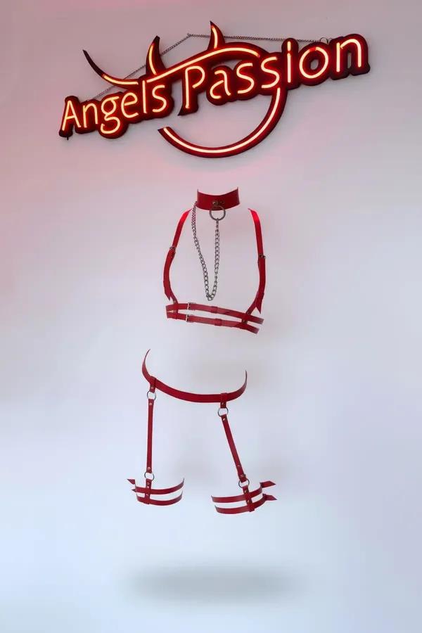 Red faux leather body harness set with silver O-ring choker, chain, chest harness, waist belt, and thigh garter bands