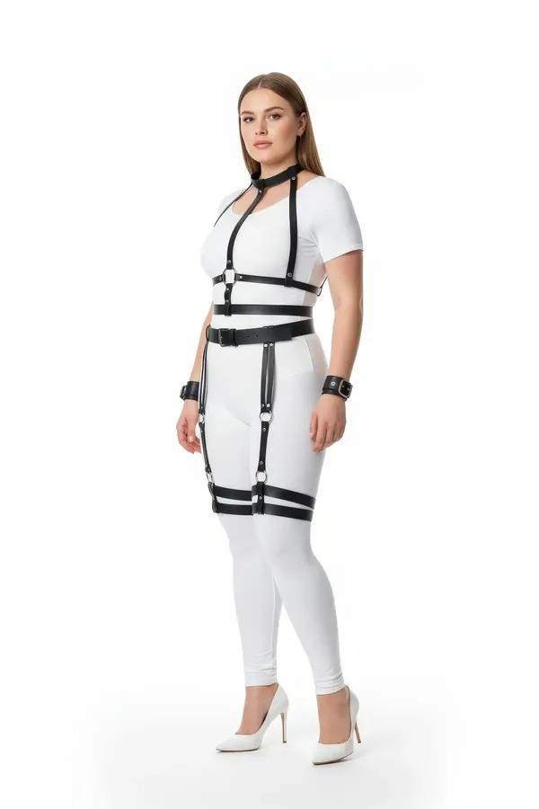 Black faux leather full body harness set with chest straps, waist belt, thigh garters and wrist cuffs, silver O-ring hardware