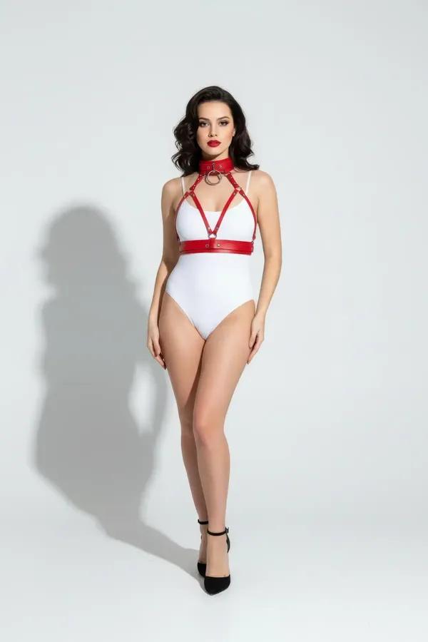 Red faux leather chest harness set with O-ring choker and wide underbust band, silver hardware, worn over white bodysuit