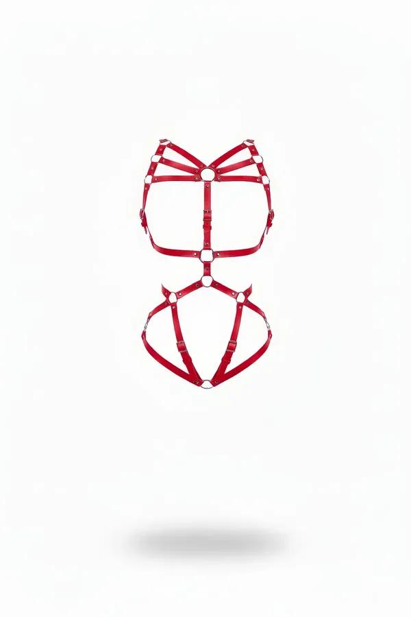 red faux leather body harness with silver O-rings and five-strap chest cage on white background