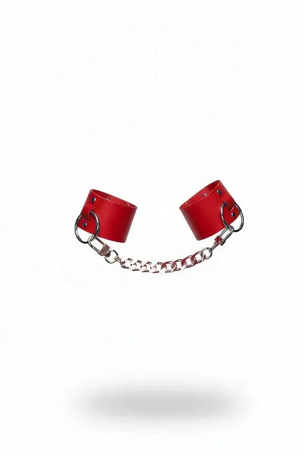 Red faux leather wrist cuffs linked by silver chain with lobster clasp O-rings