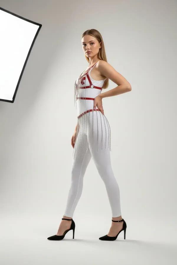 red faux leather chest harness with silver chain fringe skirt belt set, O-ring hardware, full-length view