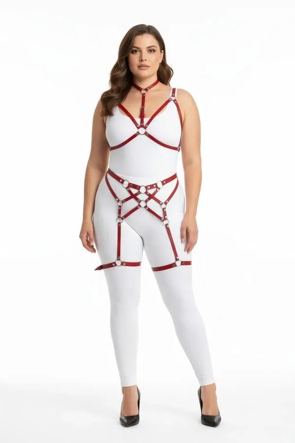 red faux leather strappy body harness set with silver O-rings chest harness waist panel and thigh garters on plus size model