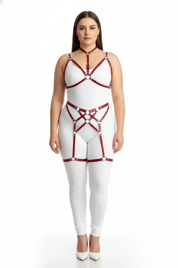 red faux leather strappy body harness set with silver O-rings chest harness waist panel and thigh garters on plus size model