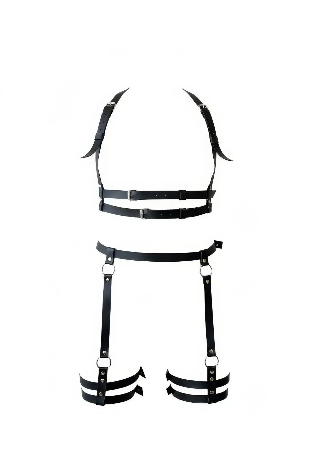 Black faux leather full body harness set with silver O-rings and double-band thigh garters laid flat on white background