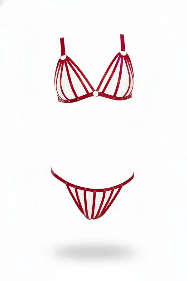 red faux leather caged bra and thong harness set with silver O-rings and multi-strap cage cups on white background