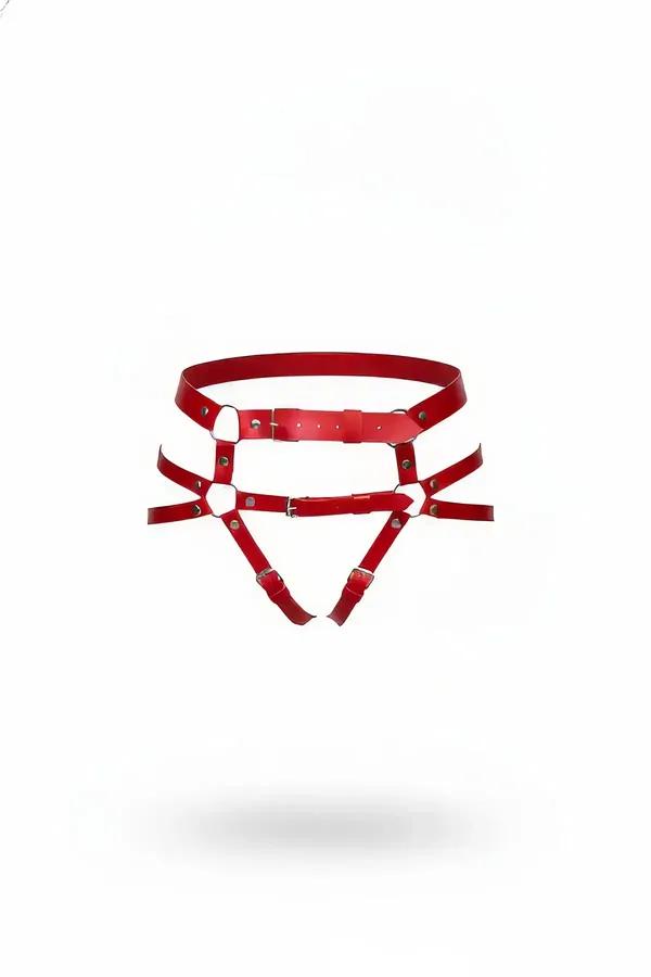 Red faux leather waist harness with dual O-rings triangular hip panel and two silver-buckle garter straps on white background