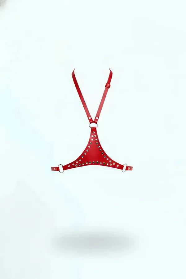Red faux leather studded halter chest harness with silver dome rivets and three D-ring connections on white background