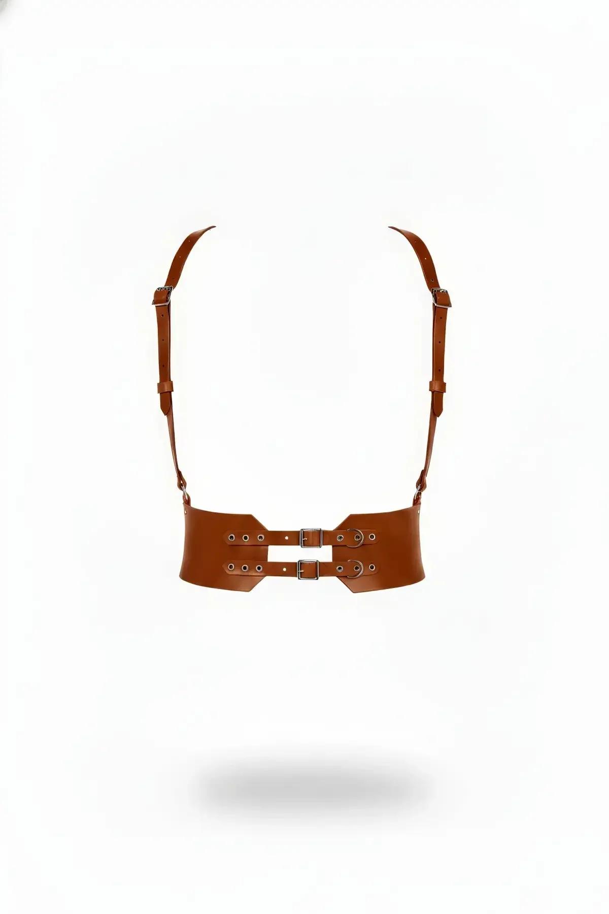 tan faux leather waspie belt harness front view with dual silver buckles and adjustable shoulder straps on white background