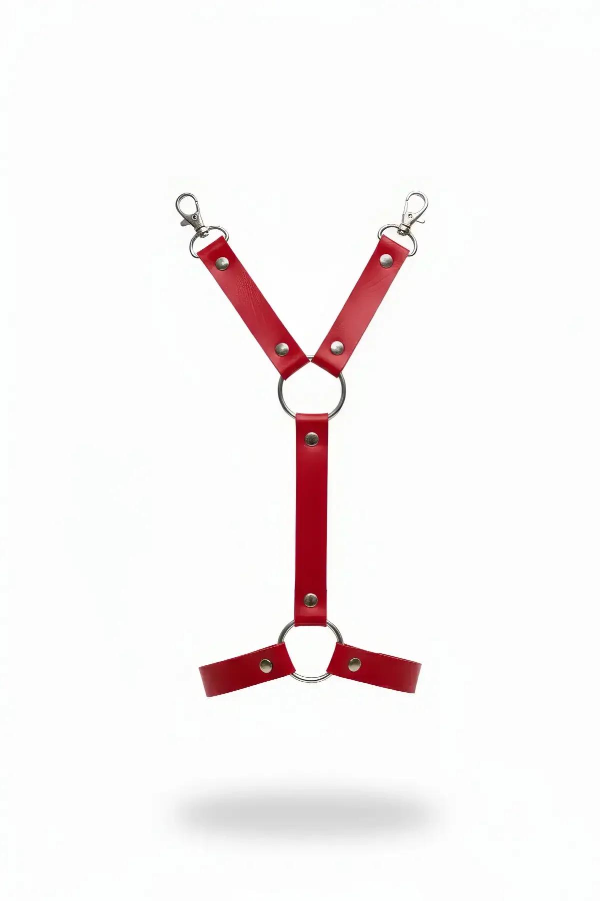 Red faux leather garter harness with dual silver O-rings and Y-strap configuration on white background