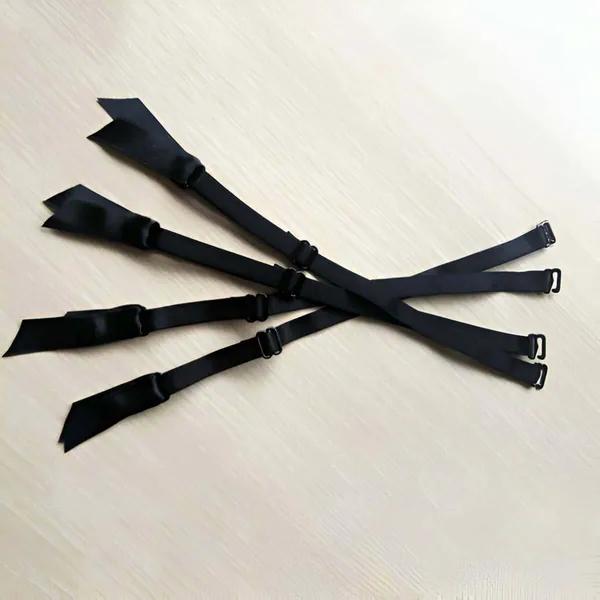 black elastic garter straps set of 4 with satin ribbon ends and black metal clips adjustable