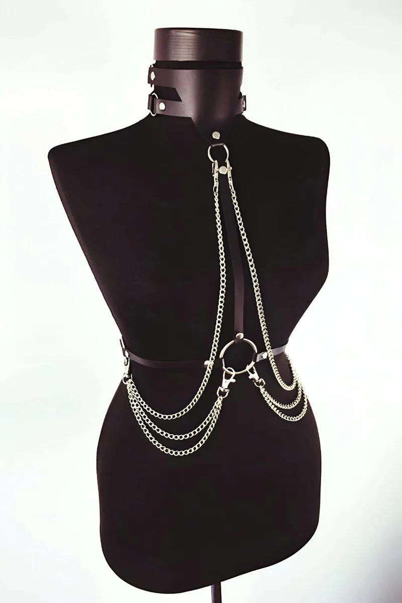 Black faux leather harness with cascading silver chains and choker detail