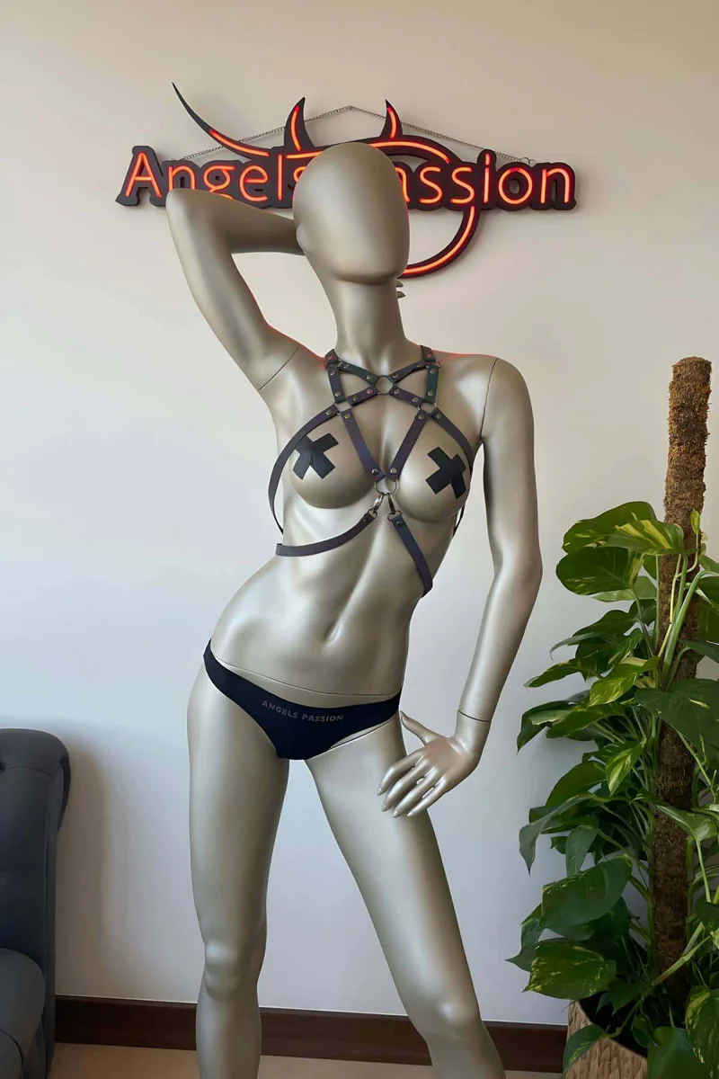 Front view of adjustable rainbow reflective body harness with cross nipple covers