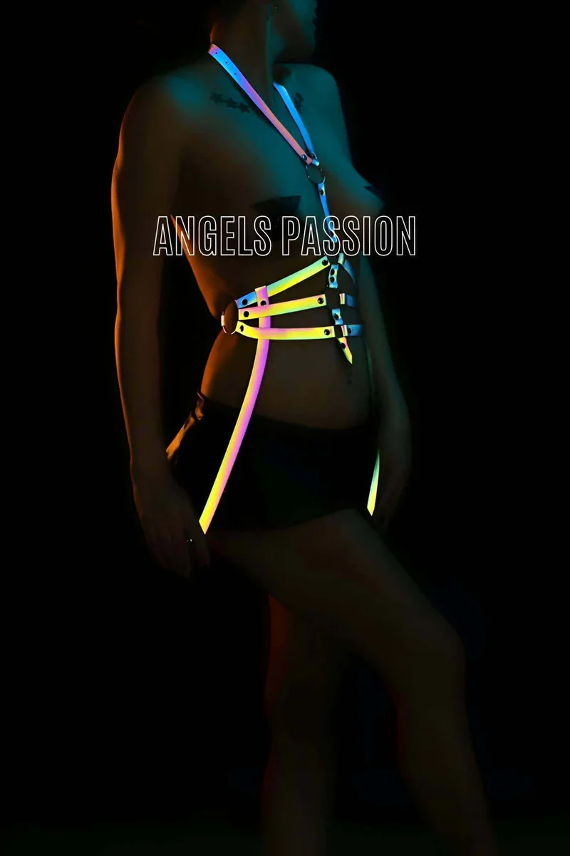 Close-up of reflective material on body harness under light
