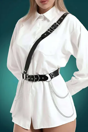 Black Faux Leather Chest Harness Belt with Triple Buckle and Chain Accents worn over white shirt