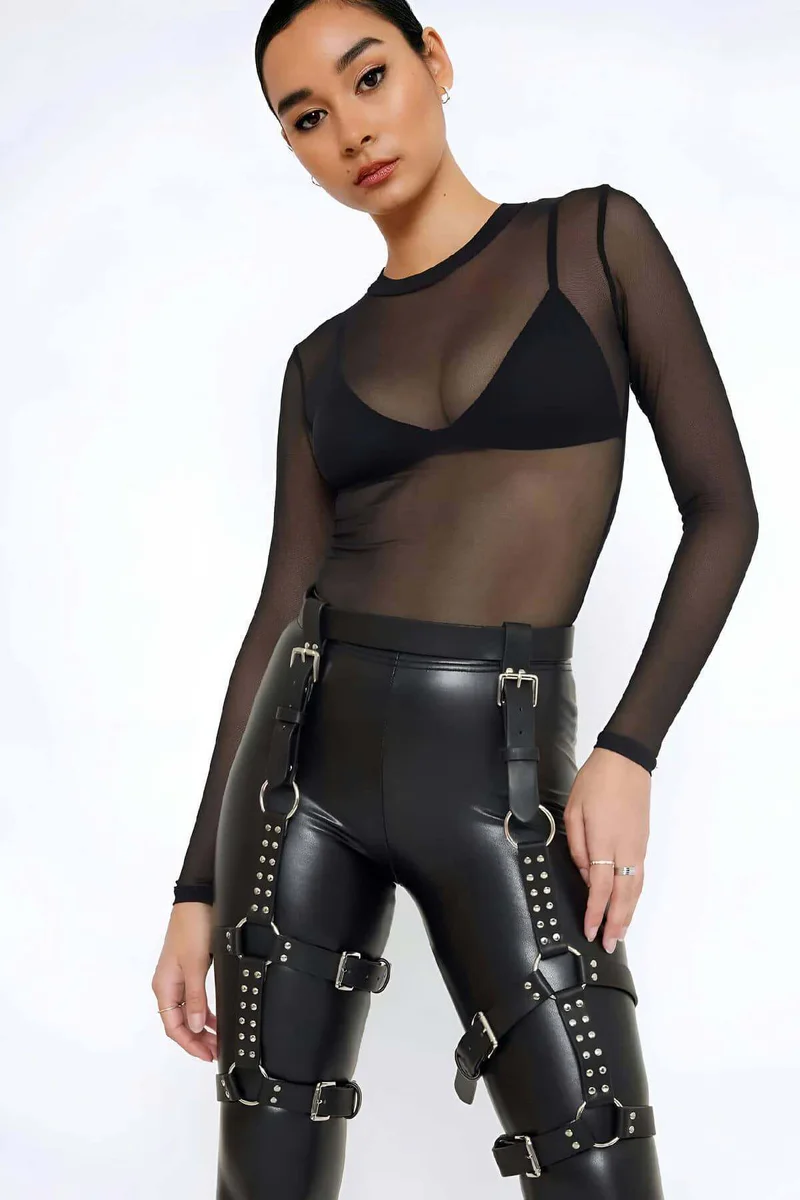 Black faux leather studded thigh harness with adjustable straps and silver O-rings