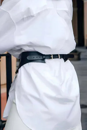 Black Faux Leather Waist Harness Belt with Silver O-Ring and Draped Chains over White Shirt